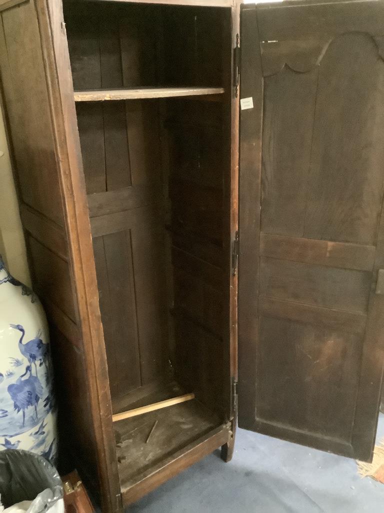 A small provincial French oak armoire, 18th century, width 80cm, depth 58cm, height 203cm